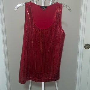 Red sleeveless sequin top! Sequins on the front only.l and back fabric is soft.